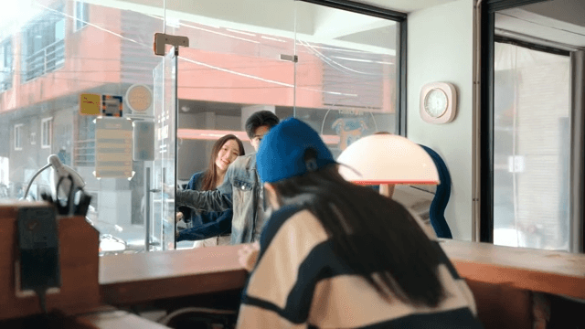 Customers coming into the pizza shop