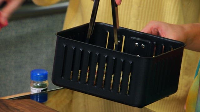 Preparing a crispy and appetizing baguette topped with green onions on a wooden cutting board