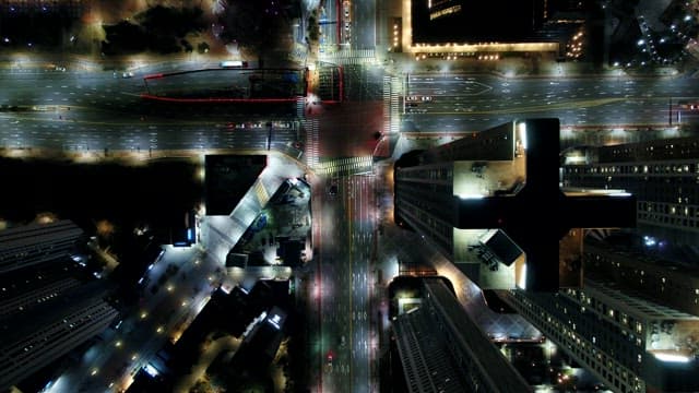 Night View Illuminated by the Lights of Buildings and Traffic in a Bustling City