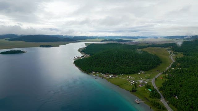 Vast lake surrounded by lush forests