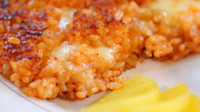 Cheese-filled kimchi fried rice on a plate