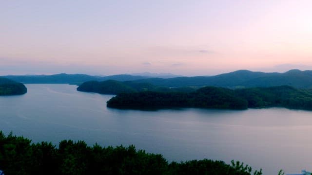 Tranquil lake surrounded by mountains