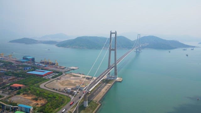 Large suspension bridge over calm sea