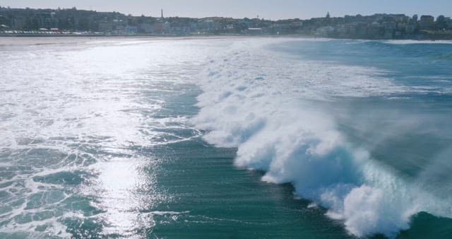 Powerful Waves Crashing on Shoreline