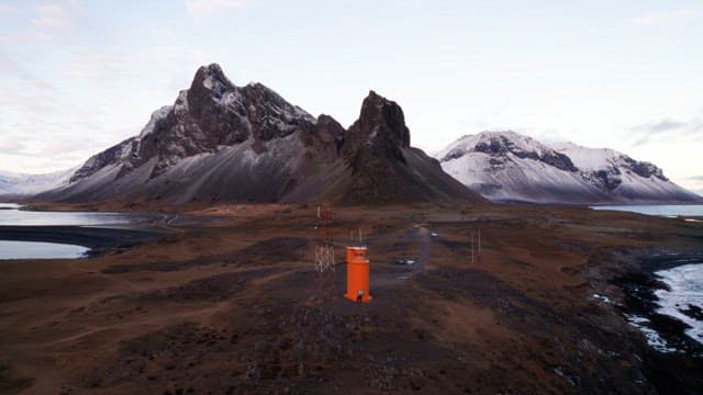 Rugged coastline and majestic mountains with lighthouses
