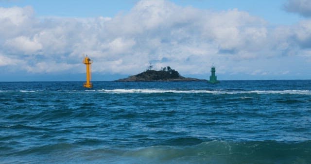 Coastal Landscape with Lighthouses and Island