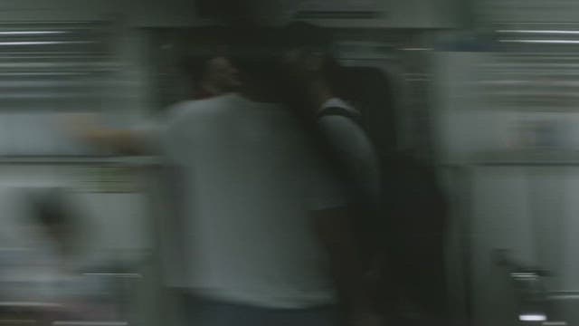 Subway running fast carrying passengers