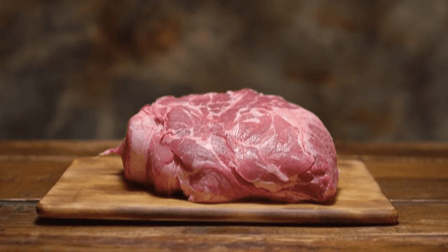 Firm Raw Meat with ViVid Colors on a Wooden Board