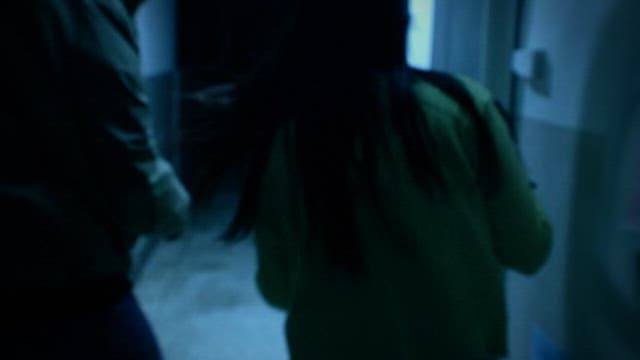 Woman Entering the House After Opening the Front Door Lock