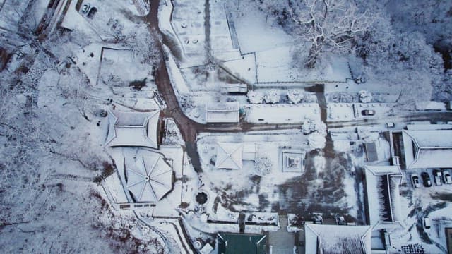 Snow-covered traditional Korean temple