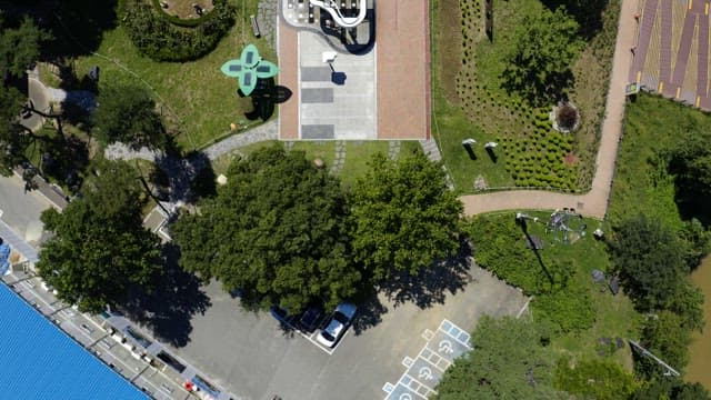 View of the park full of green and colorful structures on a sunny day