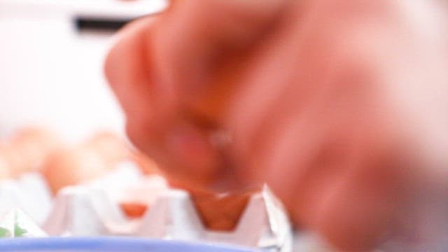 Eggs added to chopped vegetables