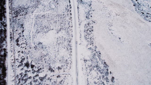 Car driving on a snowy road