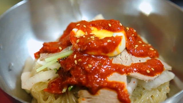 Sauce Poured over Neatly Prepared Noodles