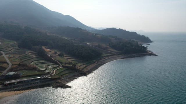 Terraced fields by the seaside of peaceful South Sea