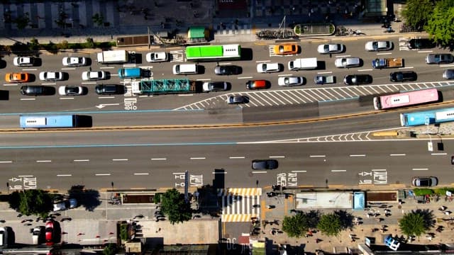 Busy city street with heavy traffic in daytime