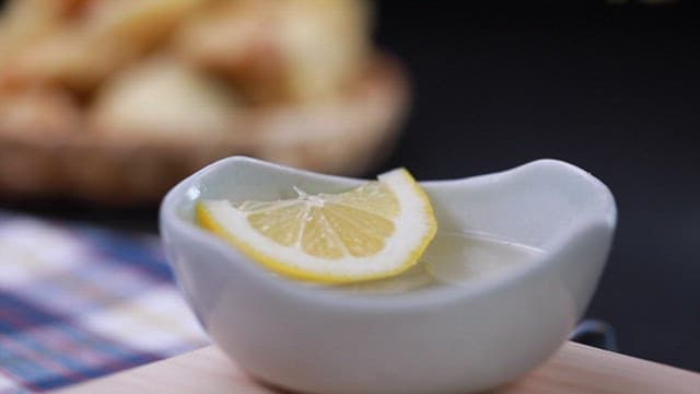 Fried webfoot octopus dipped in lemon sauce