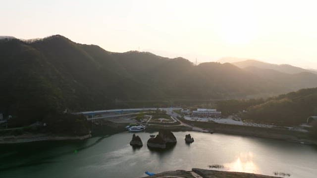 Mountain landscape with a river at sunset