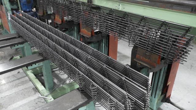 Metal springs being processed in a factory
