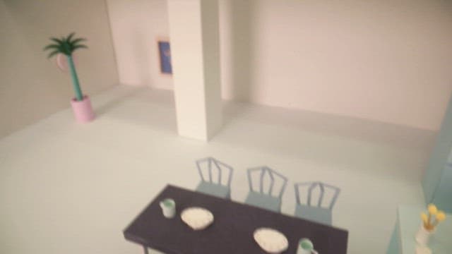 Minimalist kitchen with dining table and white interior