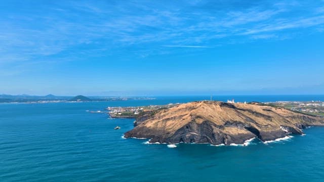 Scenic island surrounded by blue sea