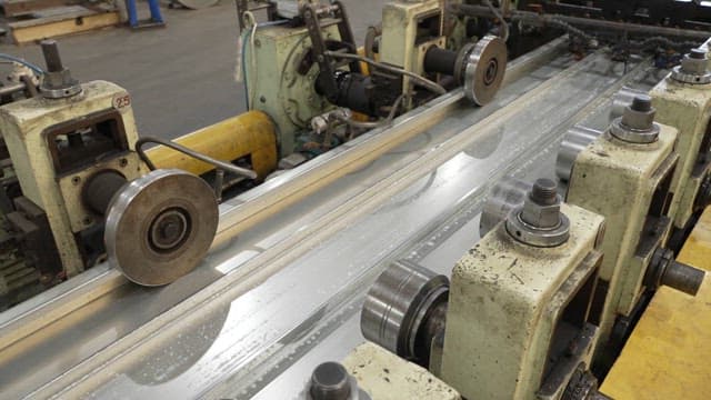 Metal sheet being processed in a factory