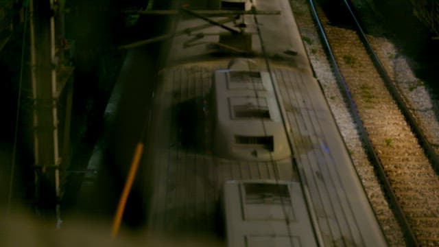 Train passing through a dark railway