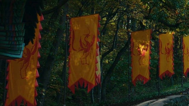 Flags with Mythical Creatures Along Forest Path