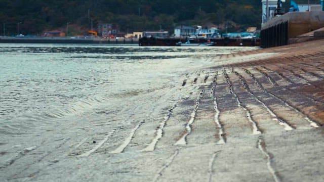 Calm seaside town with rippled waterfront