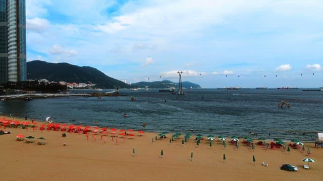 Coastal Town with Beach and Cable Car