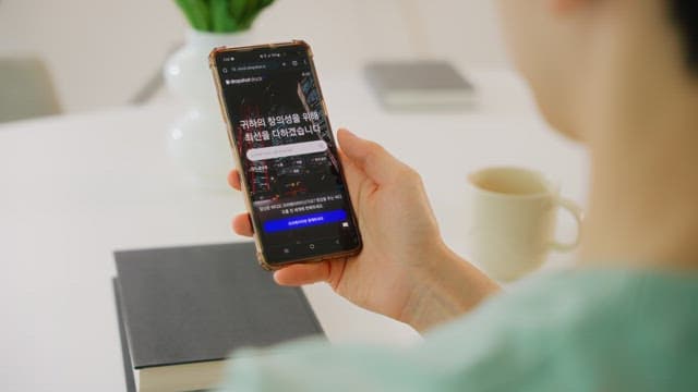 Person browsing various contents on phone