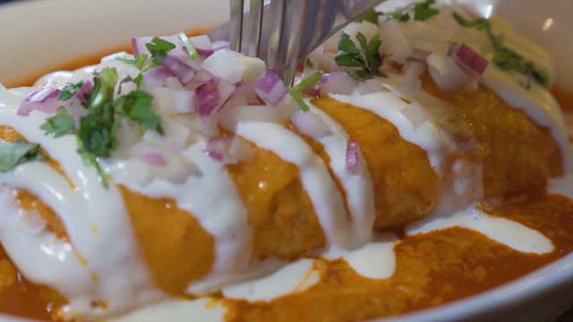 Creamy Enchiladas Topped with Fresh Ingredients