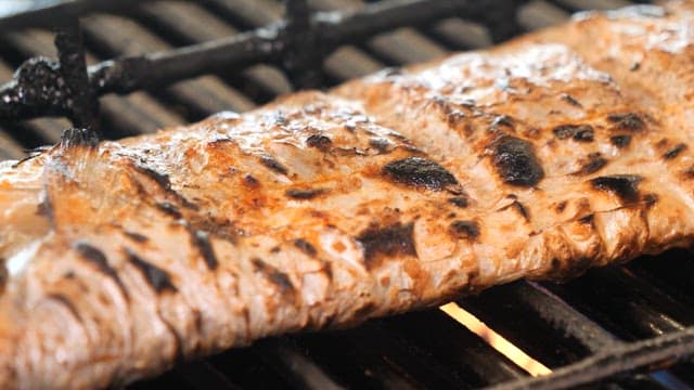 Grilled Fish Beimg Cooked on a Hot Grill