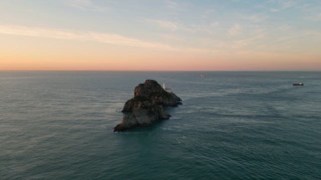 Beautiful sunset view of the island over the vast sea