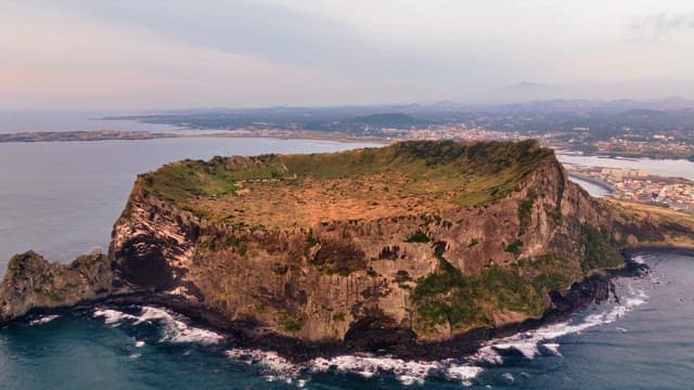 Volcanic island with a crater and ocean