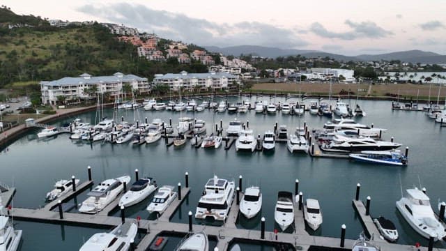 Marina with yachts and nearby buildings