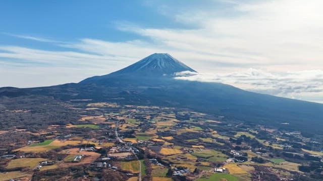 Majestic Mount Fuji with surrounding fields