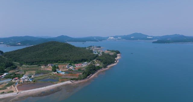 Islands and Coastal Villages on Serene Seas