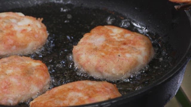 Golden Brown Potato Dough Fried in Frying Oil