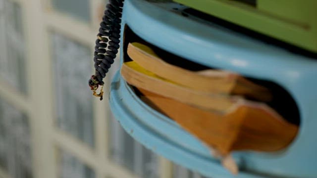 Old books on the payphone shelf