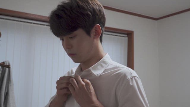 Young man getting ready for work at home