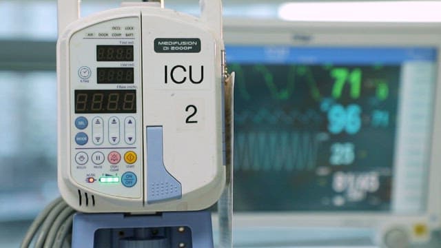 Medical equipments in a hospital room that can monitor a patient's vital signs