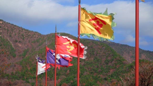 Colorful traditional flags fluttering in the mountain breeze