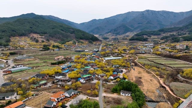 Rural village surrounded by mountains