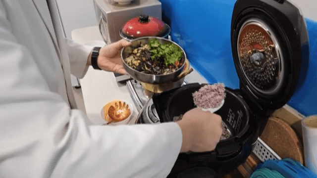 Black Rice Added to Bibimbap in the Kitchen