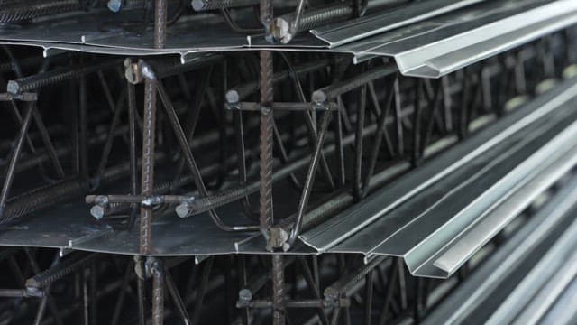 Stacked metal beams in a factory