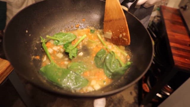 Soup Made by Stir-frying Fresh Vegetables in Wok