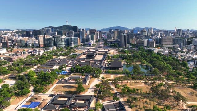 Traditional palace amidst a modern cityscape