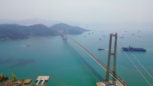Large suspension bridge over calm sea
