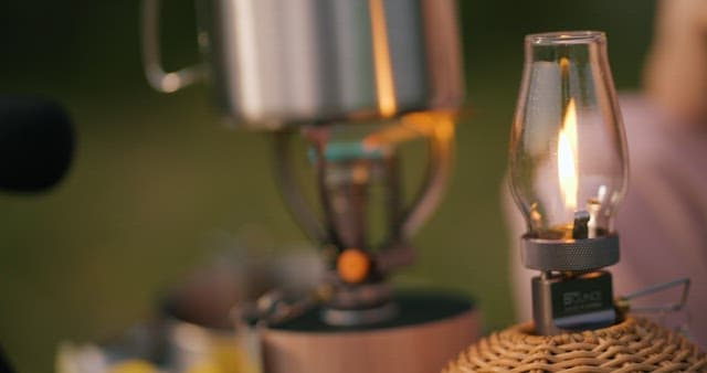 Evening Camping with Portable Lantern and Stove